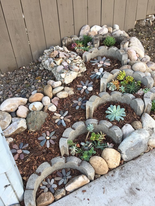 tiered succulent rock garden design